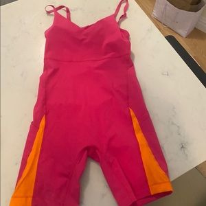 NWT Outdoor Voices Zoom 5” Bodysuit in neon orange and pink SIZE M